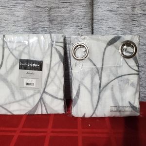 Pair of sheer curtains